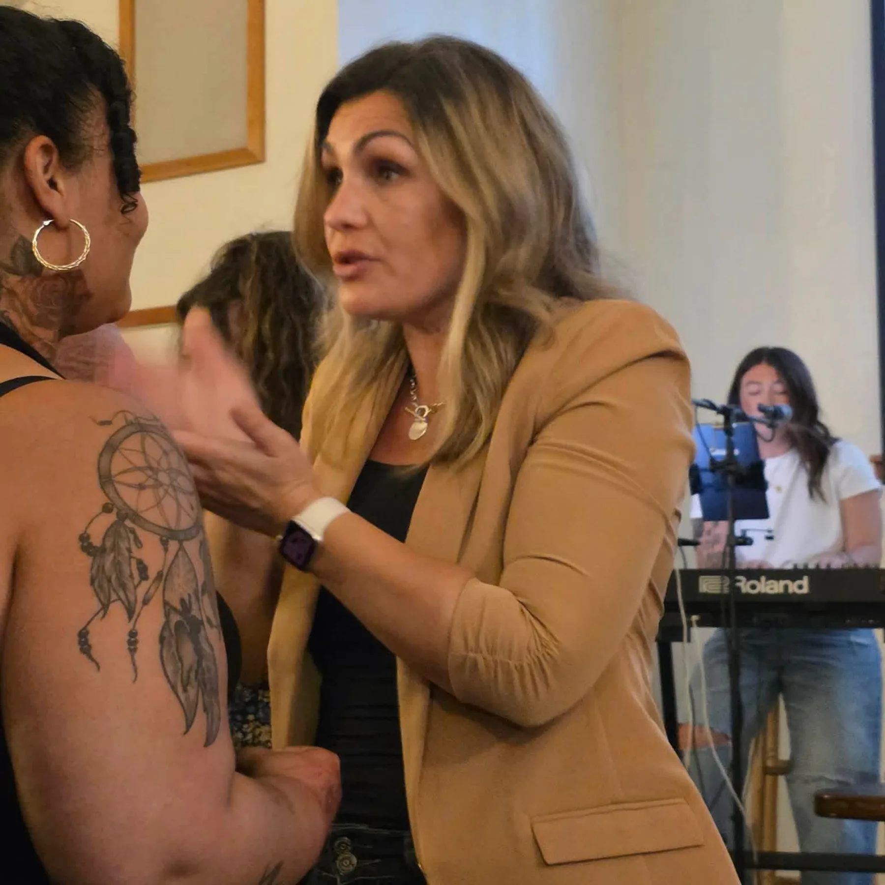 Pastor Hannah encouraging a woman in faith
