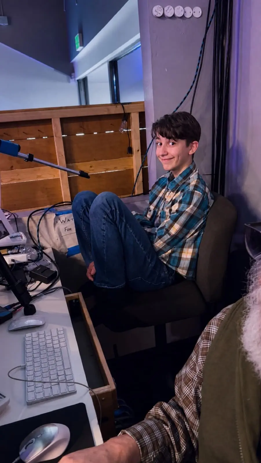 Young media volunteer in the production booth