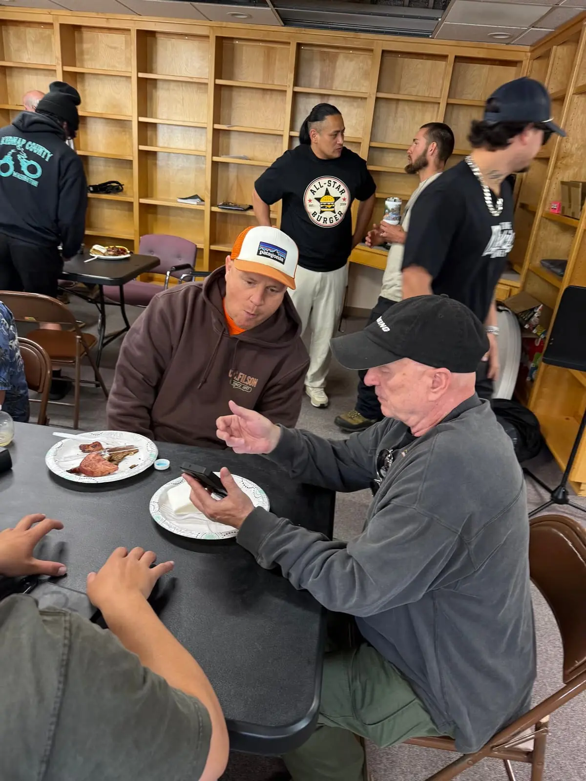 Men sharing food and fellowship at a Men's Ministry gathering