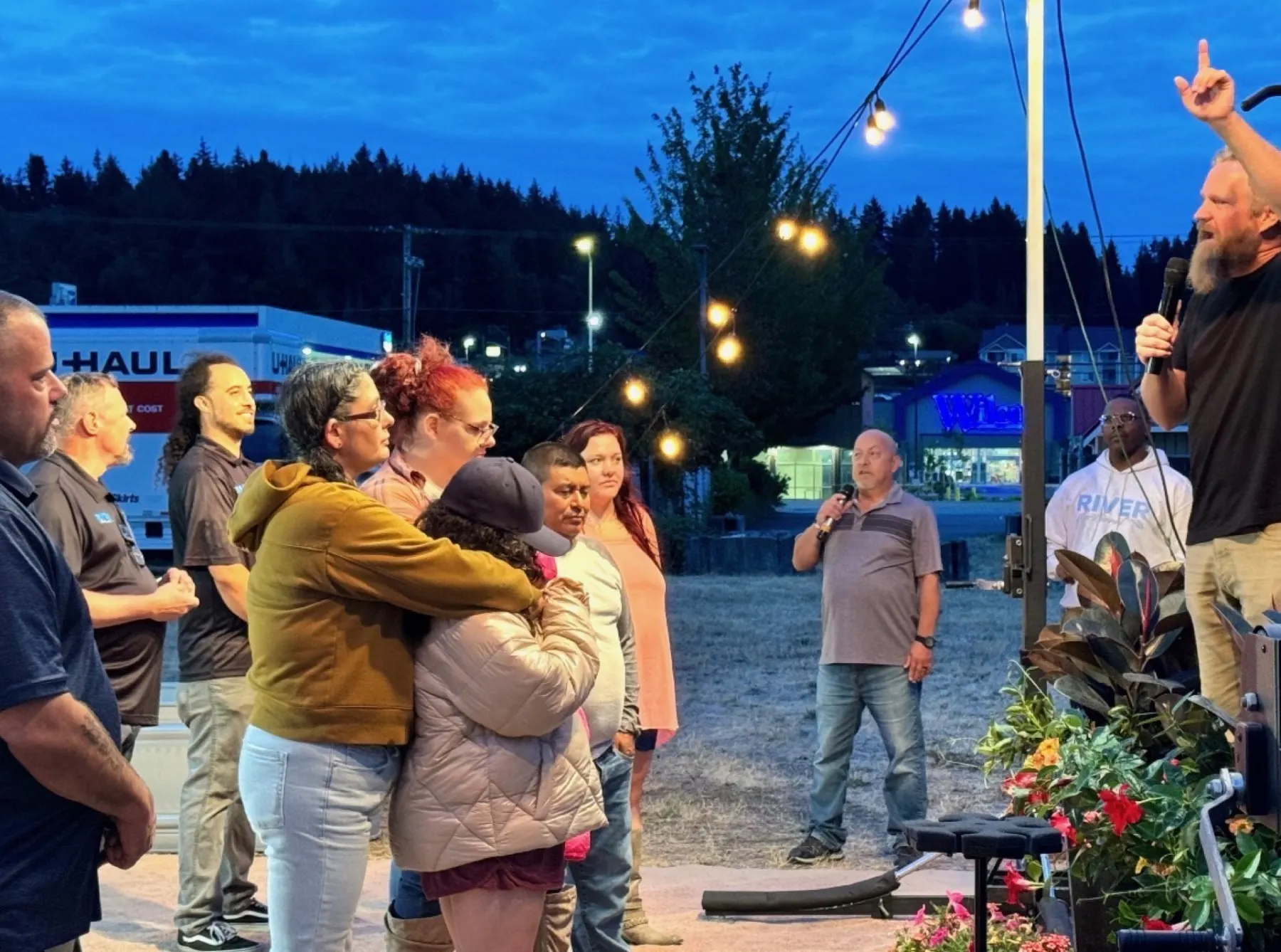 River Northwest sharing the gospel at an evening outreach