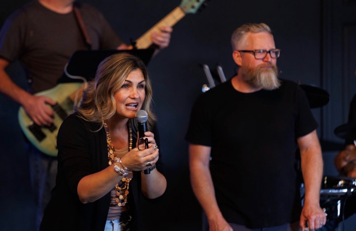 Pastors Hannah and Jason Gillick ministering at River Northwest Church