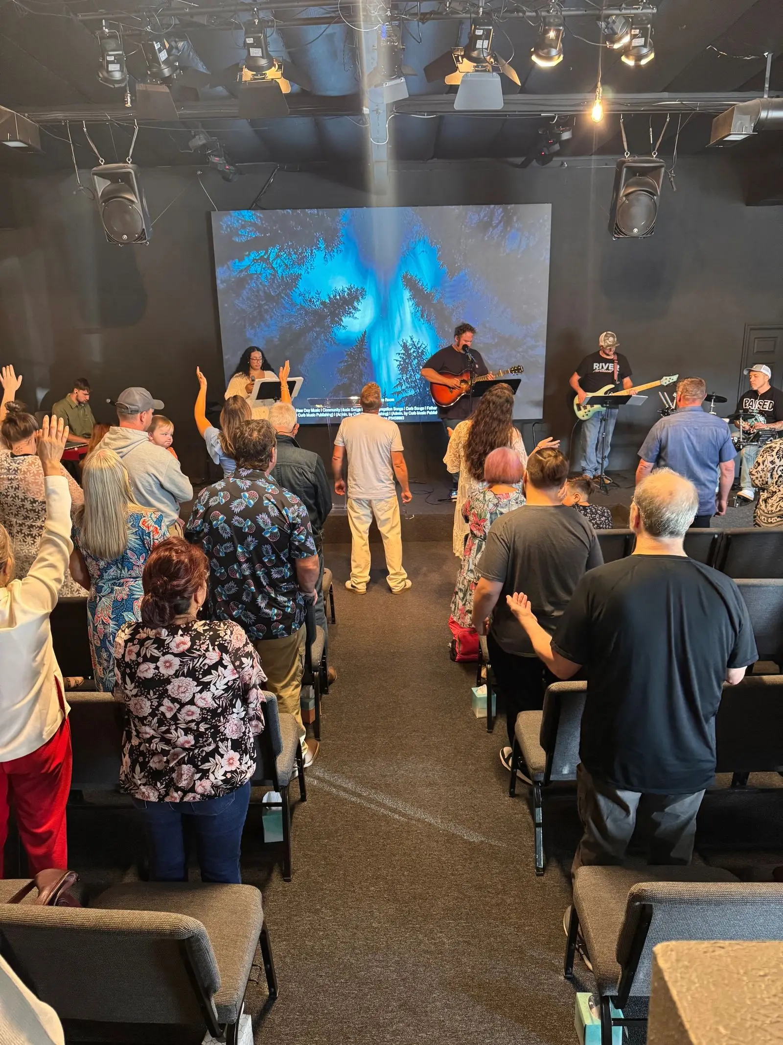 River Northwest congregation worshiping together